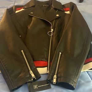 INC faux leather Moto jacket in black w/ red/white trim at the bottom